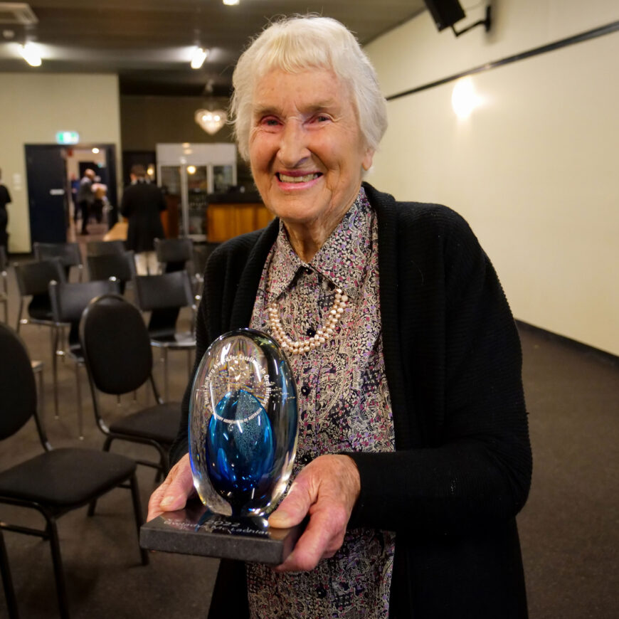 2022 winner of Hazel de Berg award holding her award